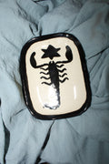 white scorpion tray