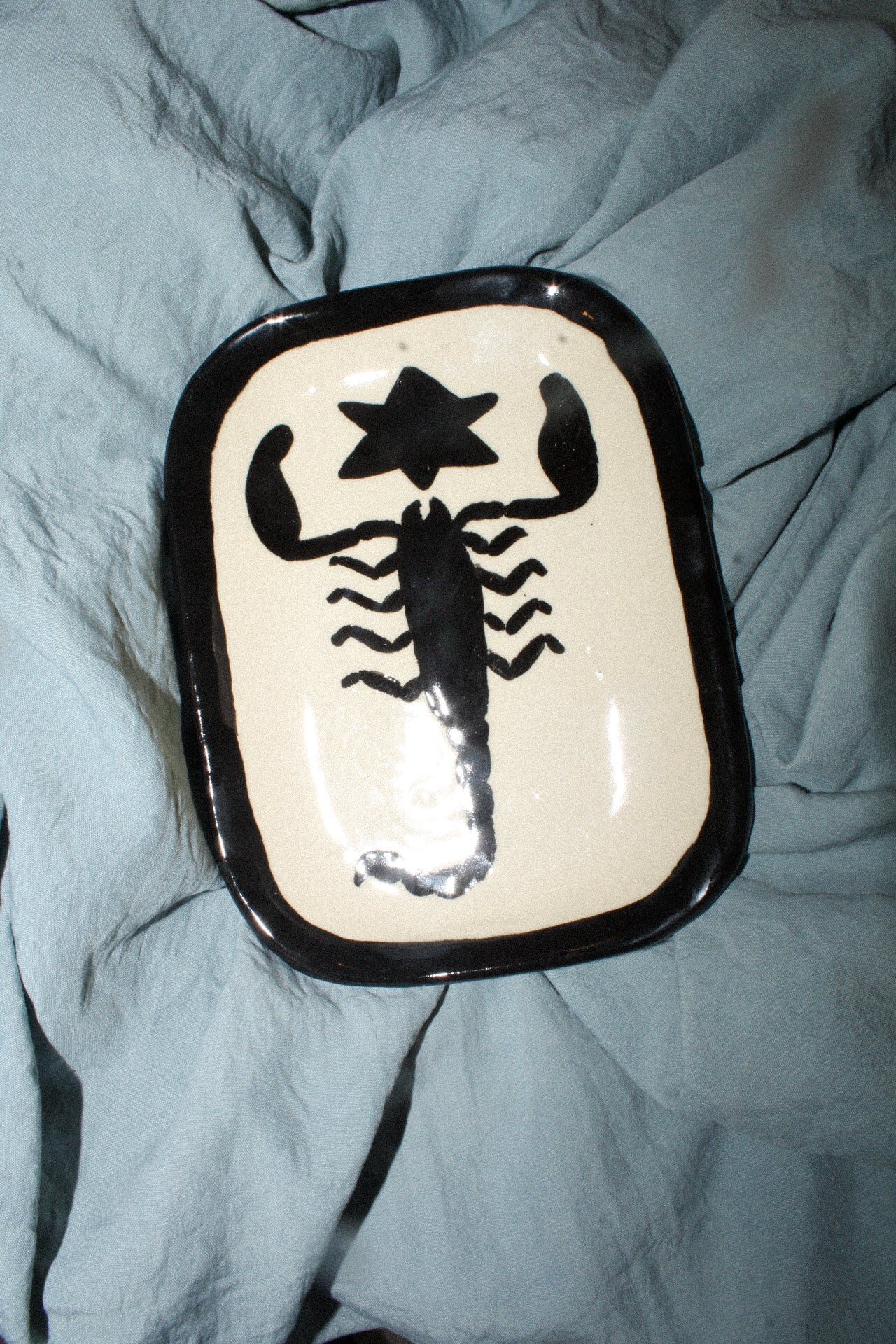 white scorpion tray